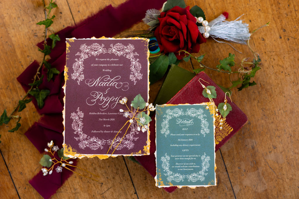 detail shot of Pre-Raphaelite inspired wedding stationery with ivy leaf hair accessories and jewellery