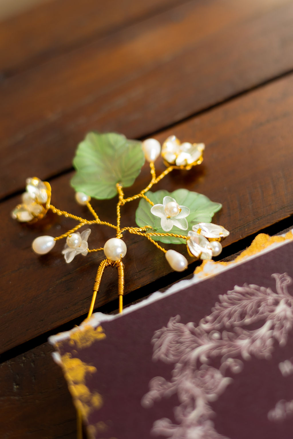detail shot of an ivy leaf hair pin for Pre-Raphaelite inspired wedding