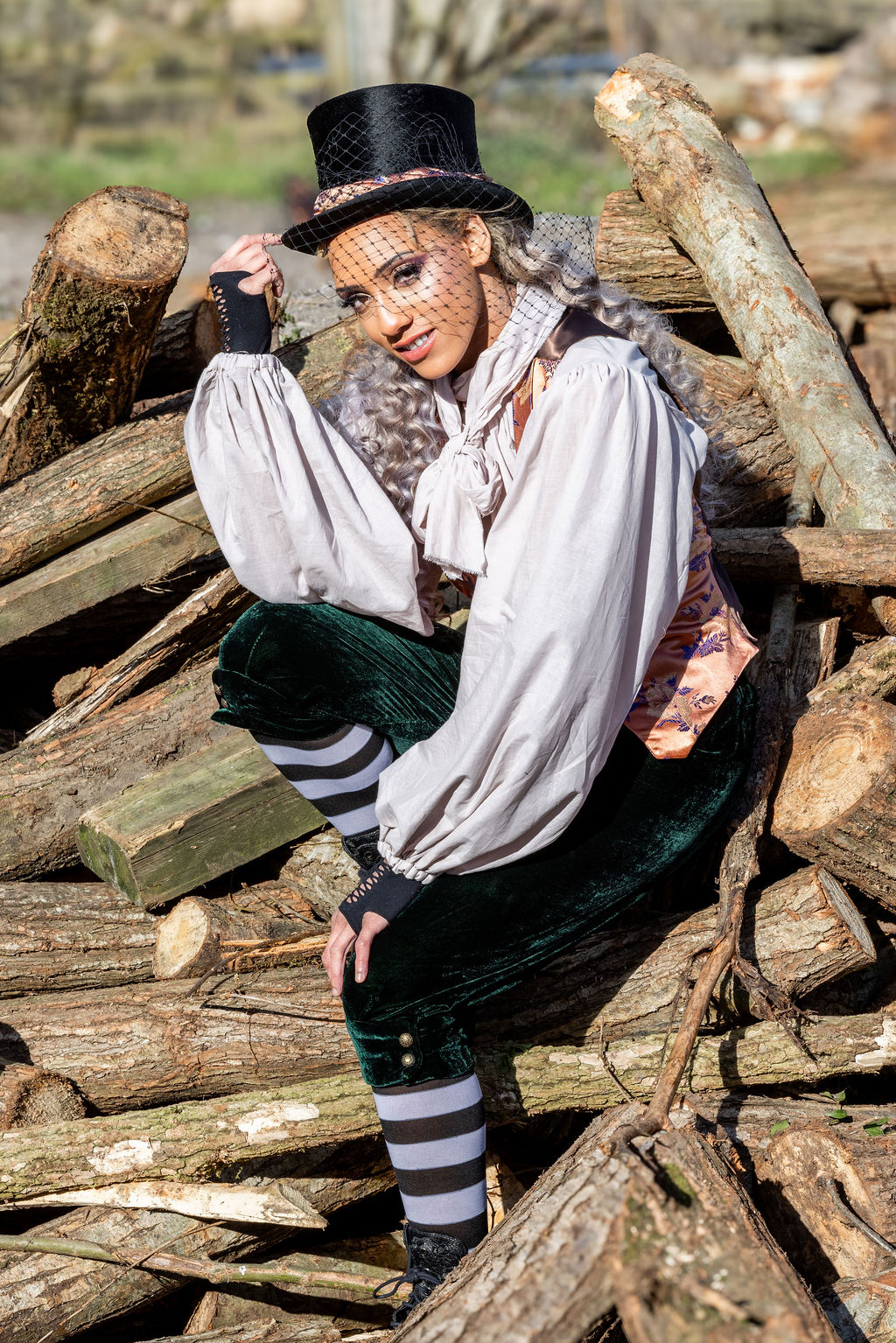 bride model wearing mad hatter cross white rabbit inspired wedding outift