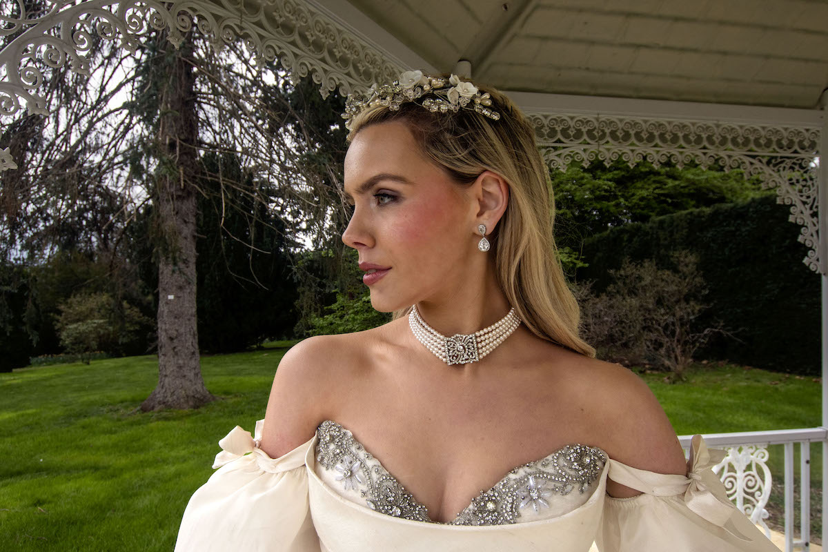 bridal portrait showing rhinestone detail of the wedding dress, accessories and jewellery