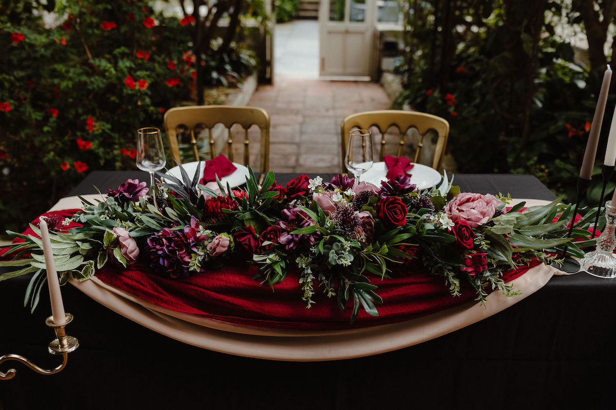 couples wedding breakfast table in a glasshouse in Cornwall