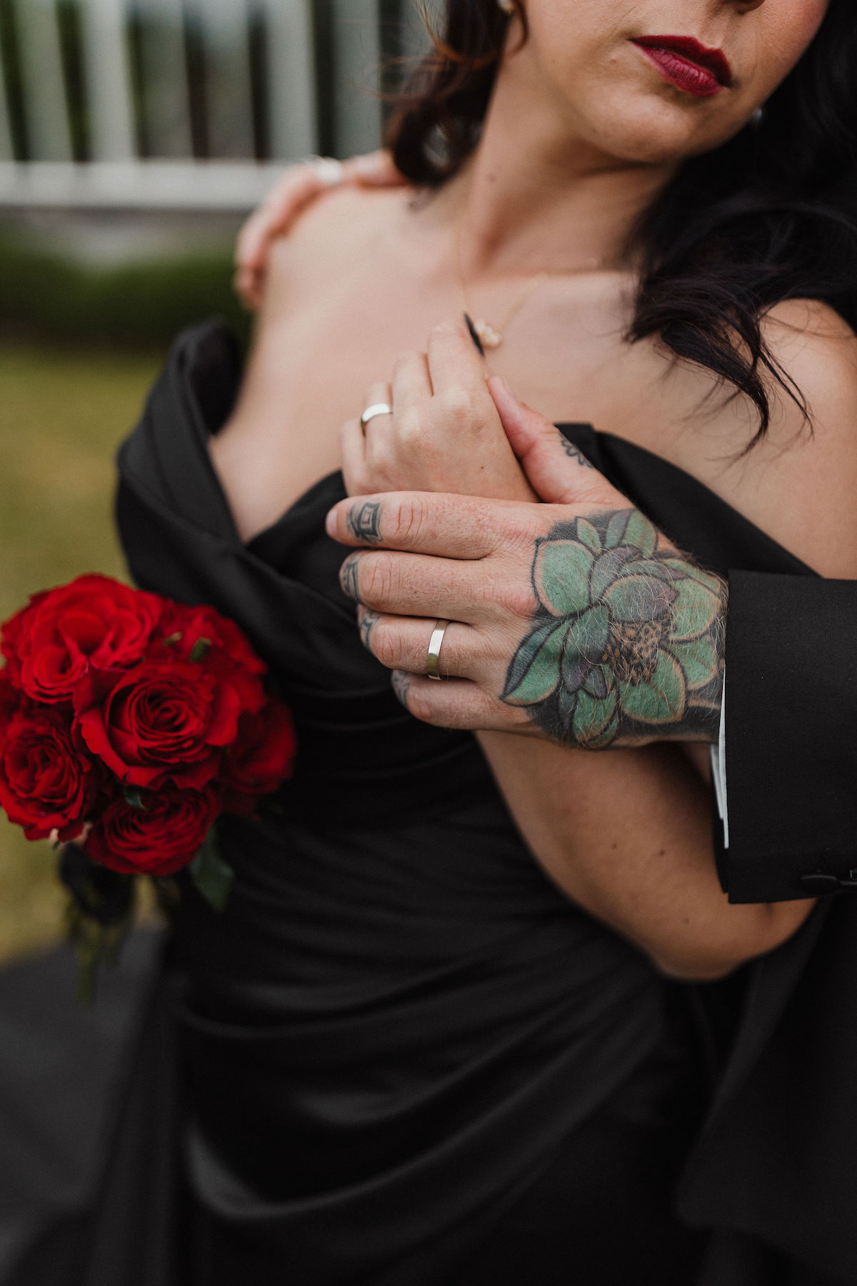 intimate portrait of a newly wedded couple with the focus on their wedding rings