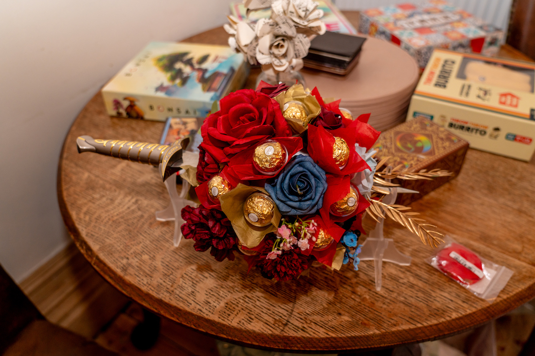close up of homemade Ferrero Rocher wedding bouquet with lord of the rings sword handle